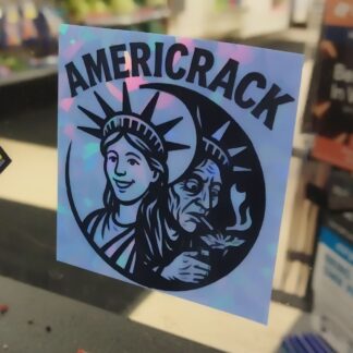 An Americrack sticker posted on a storefront window.